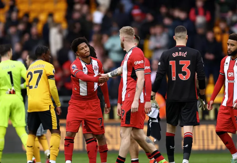 The Goal and The Explosion: A Team Under Pressure